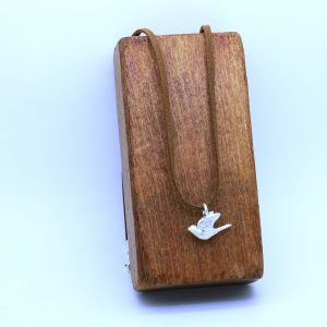 Pájaro (reproducción). Colgante